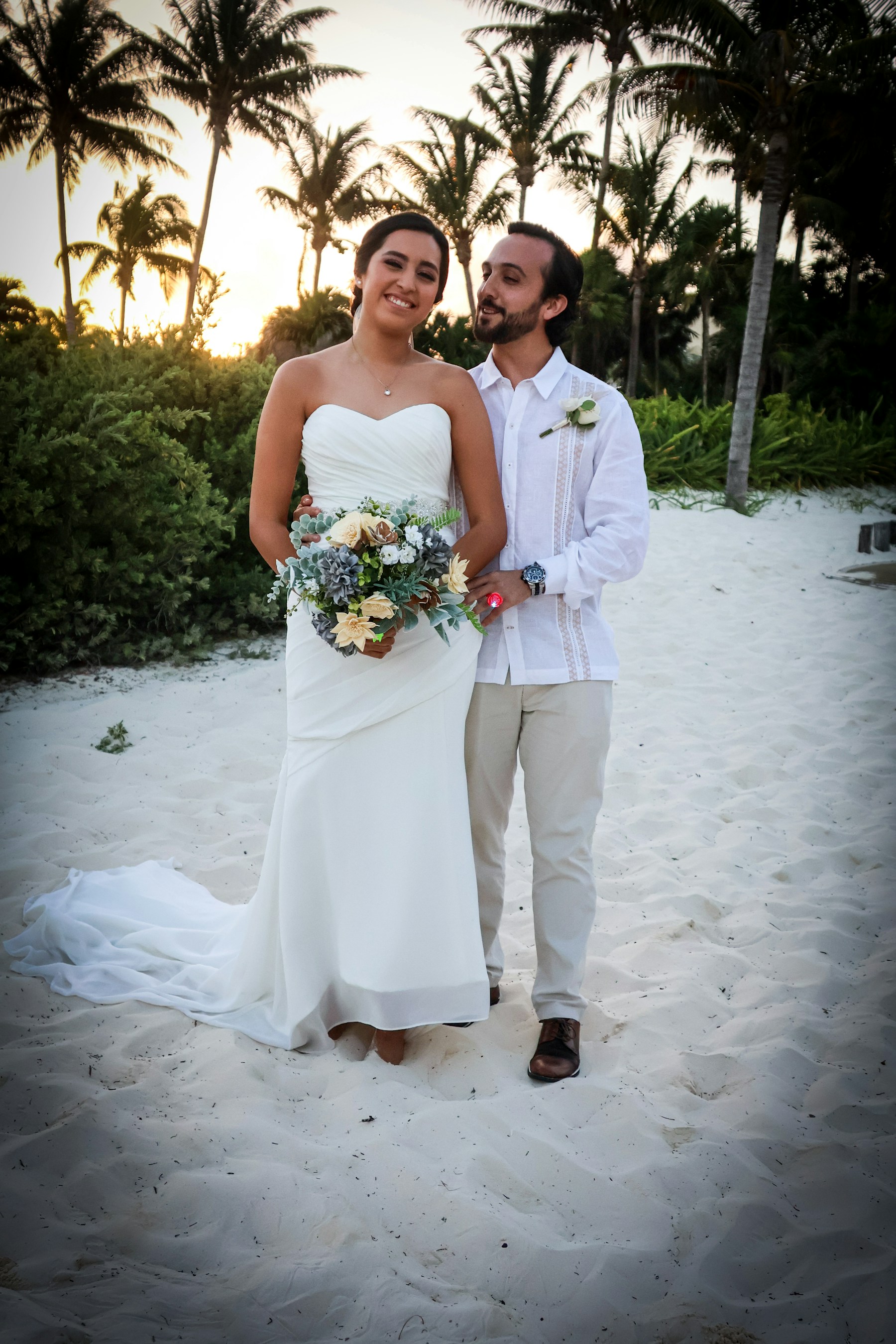 Bride and groom by the ocean in Ocean Park, San Juan