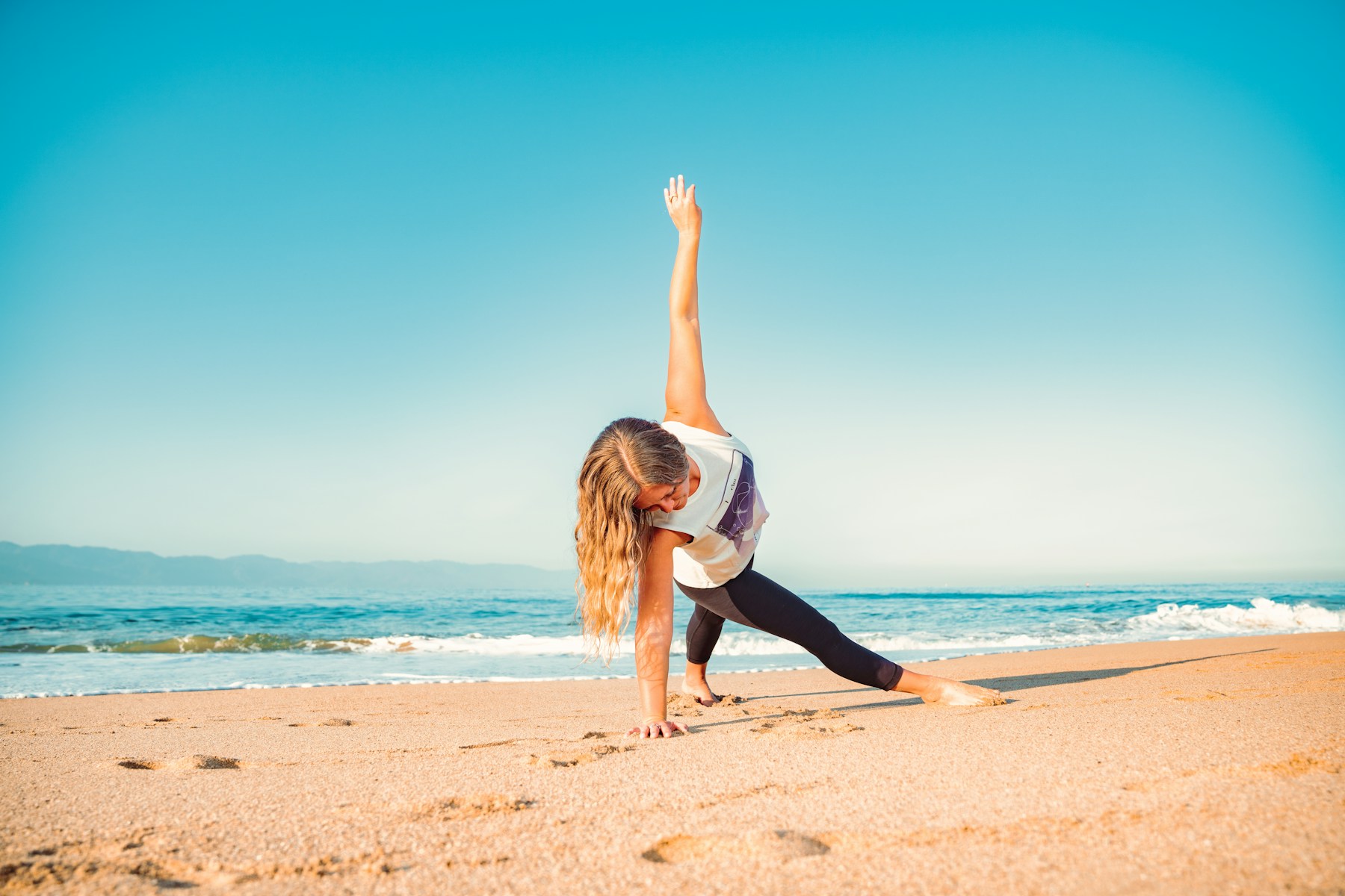 Sesión de yoga en la playa